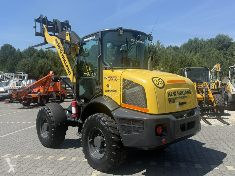 Læssemaskine New Holland C Compact Widły +...