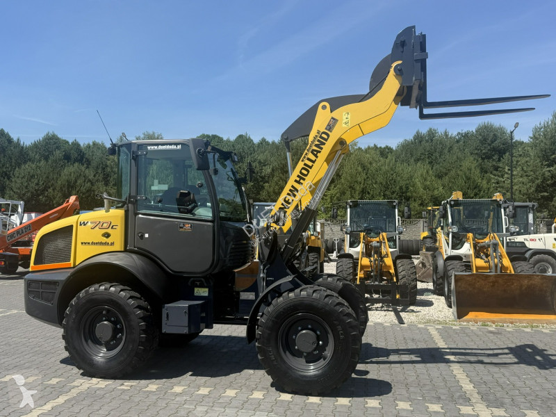 Læssemaskine New Holland C Compact Widły +...
