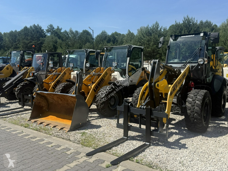 Læssemaskine New Holland C Compact Widły +...