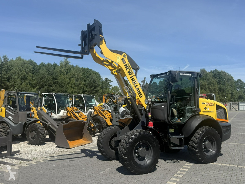 Læssemaskine New Holland C Compact Widły +...