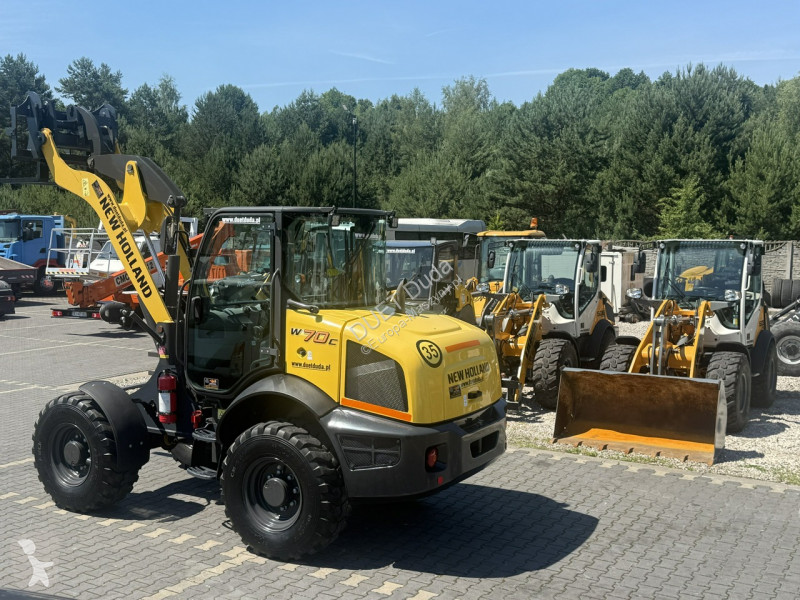 Læssemaskine New Holland C Compact Widły +...