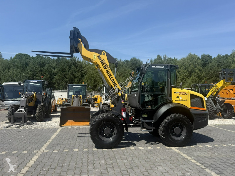 Læssemaskine New Holland C Compact Widły +...