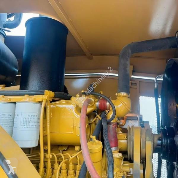 مُحمّلة Caterpillar Chargeuse sur pneus...