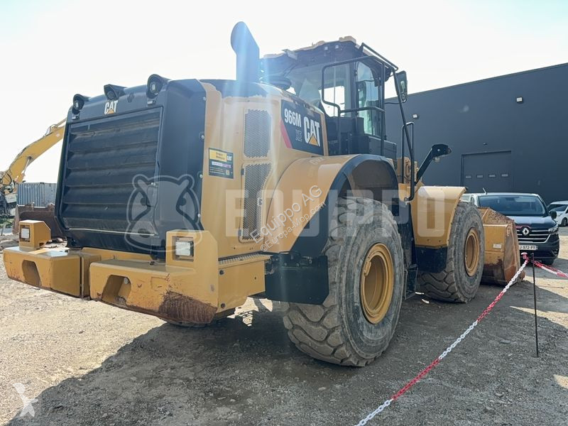 Nakladač Caterpillar XE