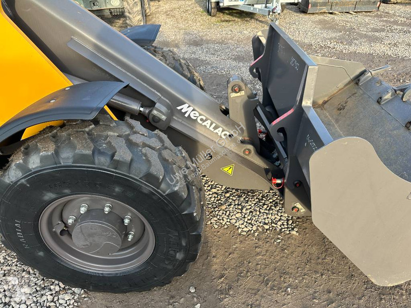 مُحمّلة Mecalac AX 700 Radlader netto 41.000 EUR