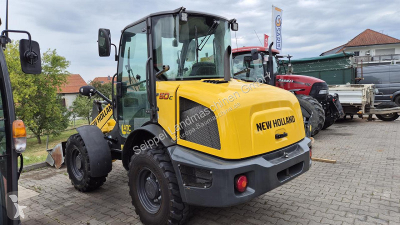 Фронтальный погрузчик New Holland C
