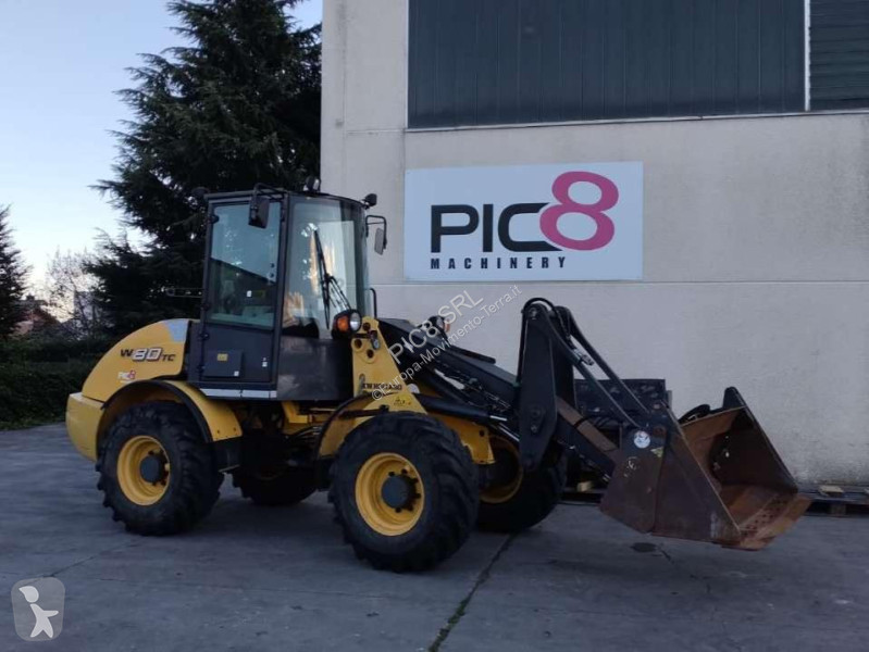 Фронтальный погрузчик New Holland TC