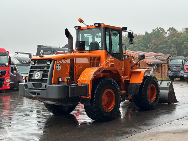 Навантажувач Doosan inkl. Schaufel & Gabel...