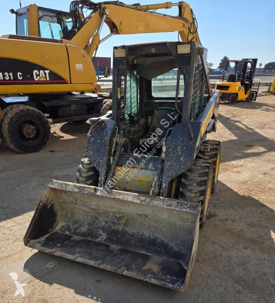 Фронтальный погрузчик New Holland