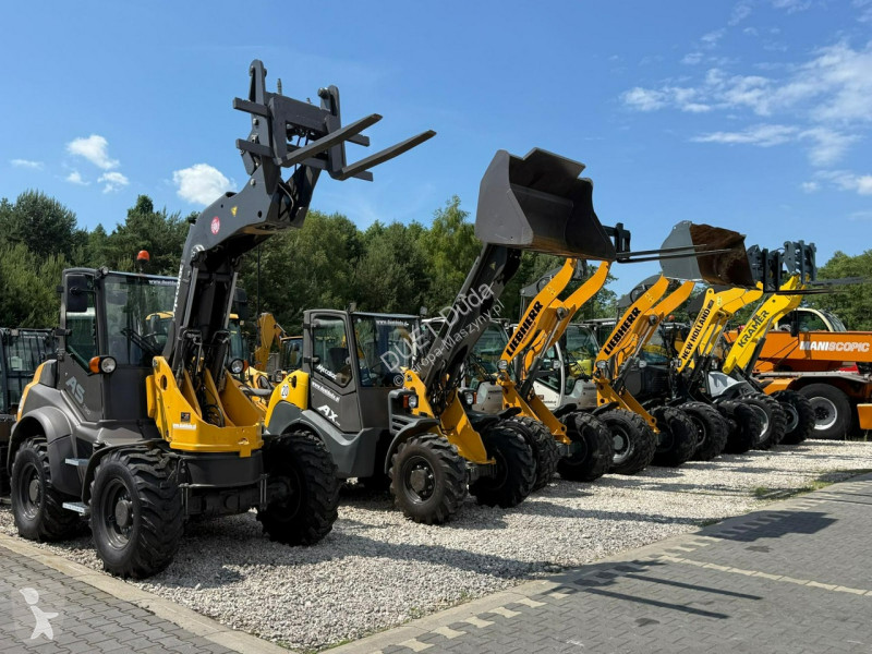 Læssemaskine New Holland C Compact Widły +...