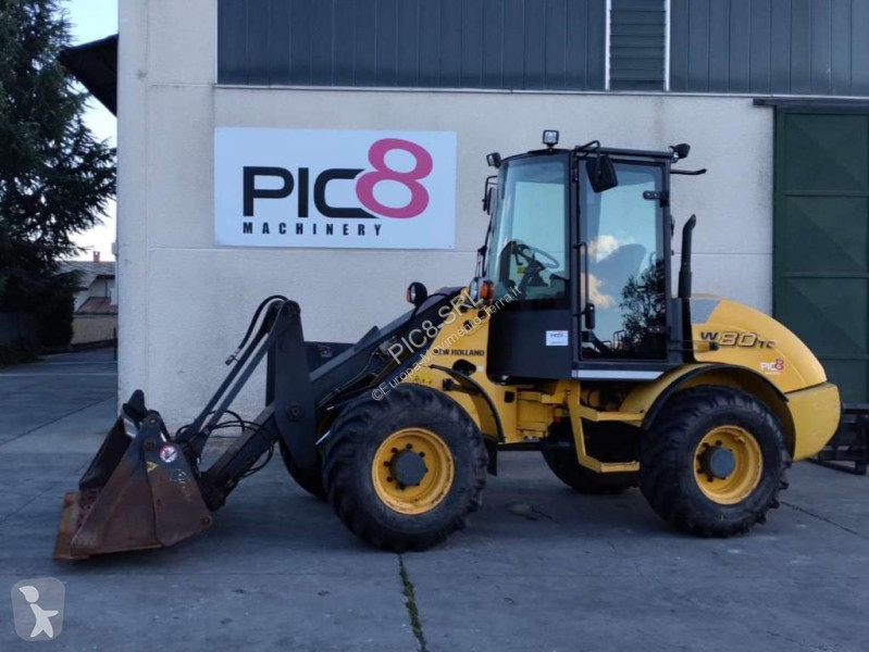 Фронтальный погрузчик New Holland TC
