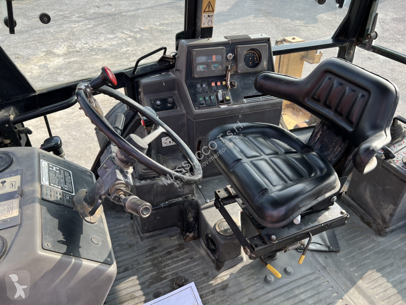 Фронтальный погрузчик Ford 675D 4x4