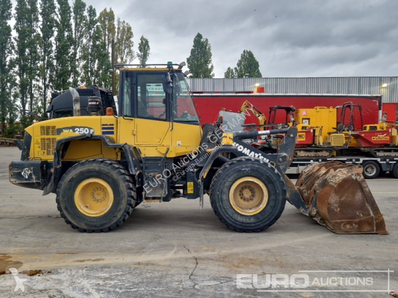 Incarcator Komatsu