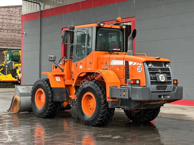 Навантажувач Doosan inkl. Schaufel & Gabel...