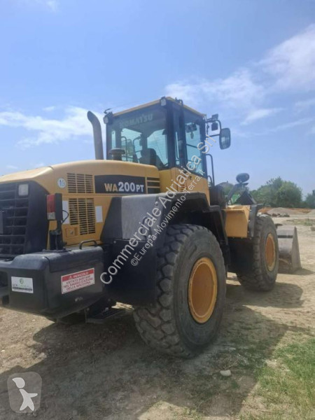 Incarcator Komatsu