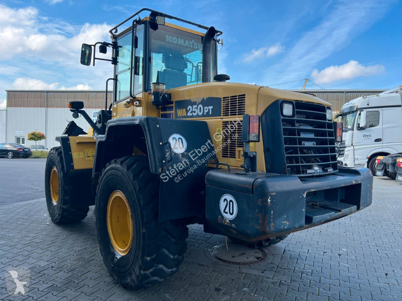 مُحمّلة Komatsu PT - 5H / 12.390h /