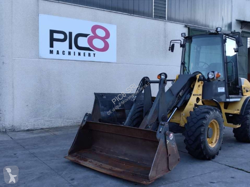 Фронтальный погрузчик New Holland TC