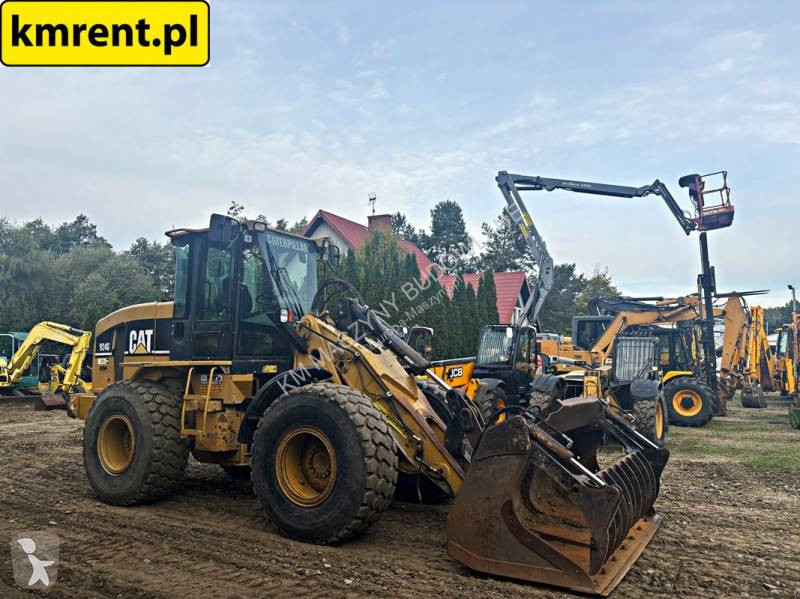 مُحمّلة Caterpillar 924 G ŁADOWARKA KOŁOWA...