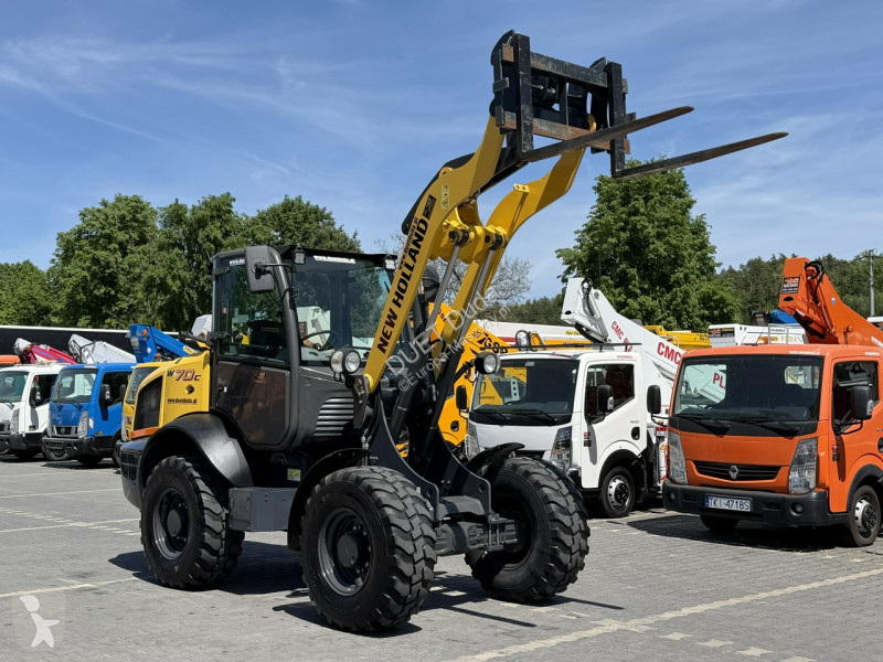 Læssemaskine New Holland C Compact Widły +...