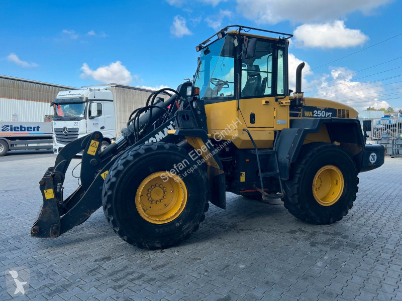 مُحمّلة Komatsu PT - 5H / 12.390h /