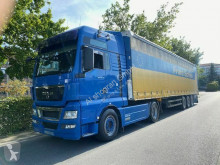 Autoarticolato Teloni scorrevoli (centinato) MAN TGX TGX 18.480 XXL Retarder / Mit Auflieger Schmitz
