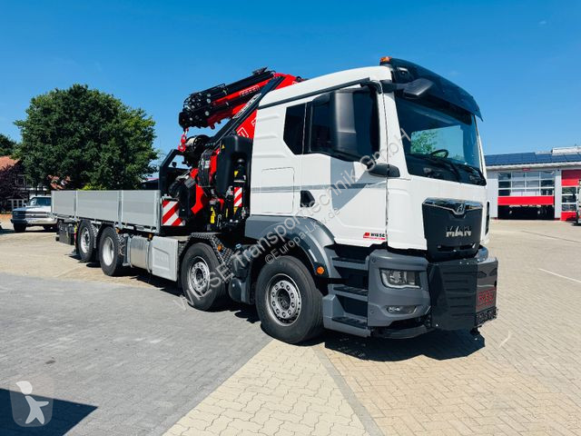 Ledat fordon MAN MAN 32.510 mit F710 Frontkran...