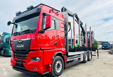 Camião transporte de madeira MAN