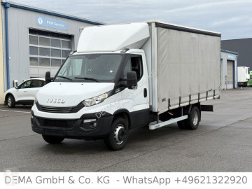 Camião caixa aberta com lona Iveco