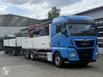 Kamion MAN TGX TGX 26.470 Euro 6 Abrollkipper mit Ladekran