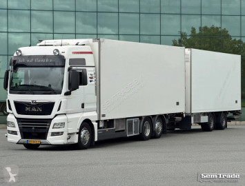 Lastbil MAN TGX 26.500 FULL AIR ONLY 872.500 KM PARK COOLING ISOLATED BOX DOUBLE DOORS FRIGOBLOCK COOLING TAIL LIFT FLOWERWIDE HOLLAND-COMBI