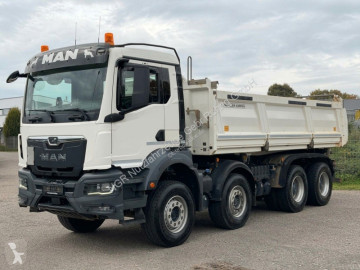 MAN three-way side tipper truck