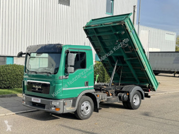 MAN three-way side tipper truck