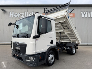 MAN three-way side tipper truck