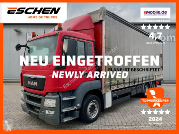 MAN tarp truck