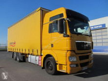 MAN TGX 26.440 truck used tautliner