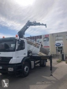 Camión Mercedes Axor 1833 volquete bilateral usado