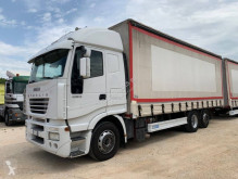 Használt függönyponyvaroló nyerges vontató és pótkocsi Iveco Stralis