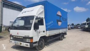 Teherautó Mitsubishi Canter FE444 használt ponyvával felszerelt plató