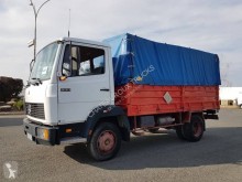 Kamión valník s bočnicami a plachtou Mercedes 809
