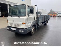 Camion plateau ridelles Nissan Eco T.135