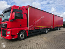 Lastbil med anhænger palletransport MAN TGX TGX 18.480 XXL E6 kompletter Zug Durchlader Anh