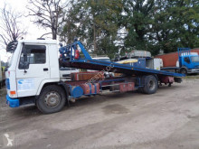 Camión Volvo FL7 portamáquinas usado