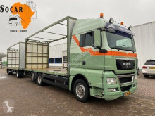 MAN tarp trailer truck TGX 26.400