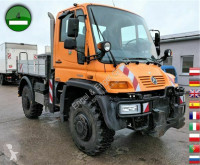 Unimog U 400 405/12 AHK KLIMA SFZ KOMMUNALHYDRAULIK truck used three-way side tipper