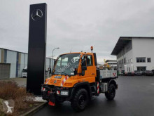Camião Unimog MB U300 4x4 Kipper Hydrostat Zapfwelle Klima tri-basculante usado