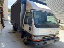 Грузовик Mitsubishi Canter шторный б/у