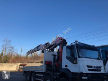 Camion plateau ridelles Iveco Trakker 450