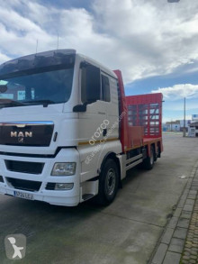 Camión MAN TGX 26.360 portamáquinas usado