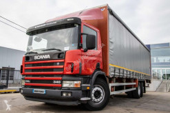 Camião Scania L caixa aberta com lona usado