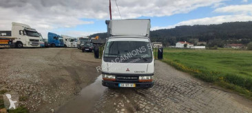 Teherautó Mitsubishi Canter FE534 használt függönyponyvaroló